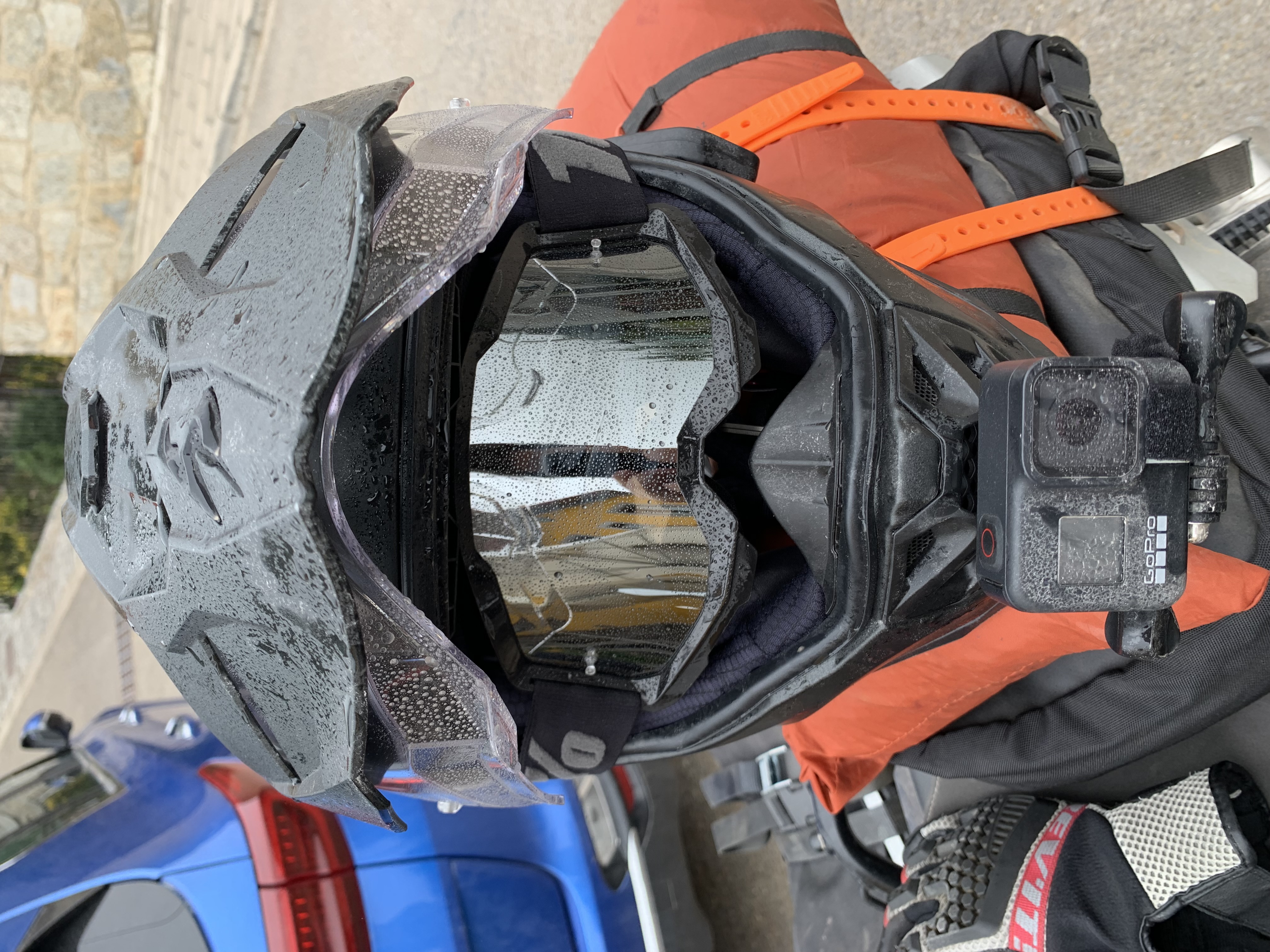 Goggles fitted in the eye port of the Scorpion ADF-9000, peak raised